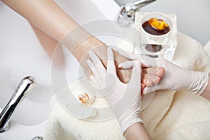 Feet honey massage spa procedure