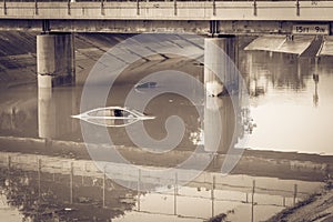 15 feet and 9 inches bridge highway elevated with flooded cars near downtown Houston