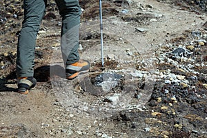 Feet of Mountain Climber in heavy high Altitude Boots