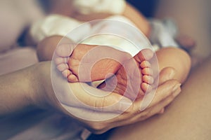 Feet of newborn baby