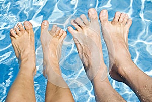 Feet Over the Swimming Pool