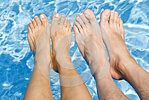 Feet Over the Swimming Pool