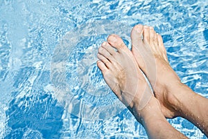 Feet Over the Swimming Pool