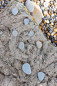 Feet Pebble stones at the sea