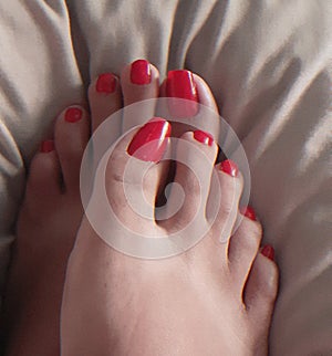 Feet with red nails