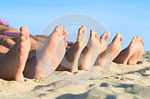 Feet relax at beach photo