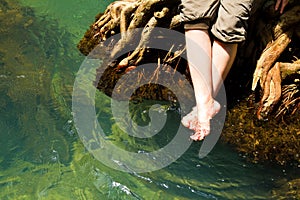 Feet relax in Crystal natural stream