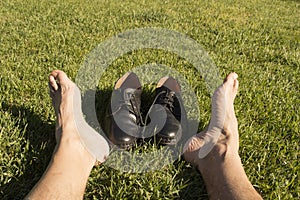 Feet relaxing in the grass