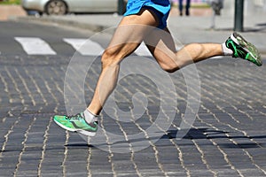 Feet running athlete on a marathon distance