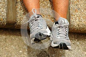 Feet with running shoes