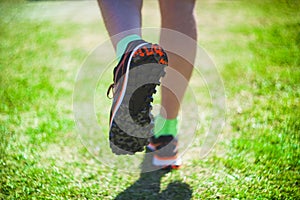 Feet with running or sport shoes