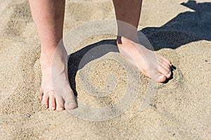 Feet in the sand