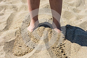 Feet in the sand