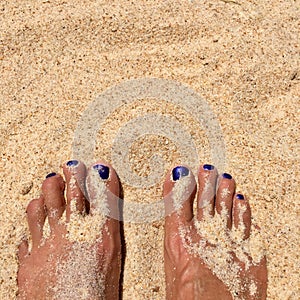 Feet in the sand