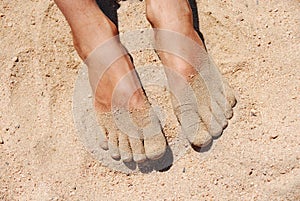 Feet in sand