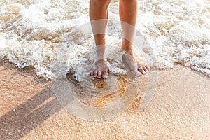 Feet on sand