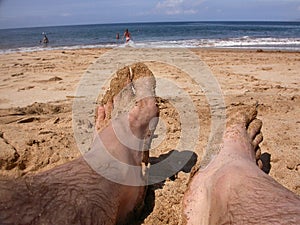 Feet in the sand photo