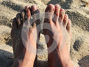 Feet in the sand