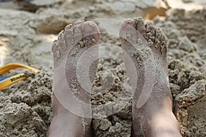 Feet in the sand