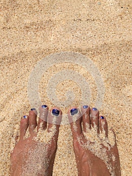 Feet in the sand