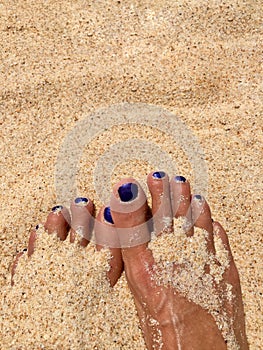 Feet in the sand