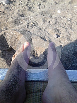 Feet in sand
