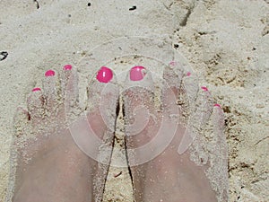 Feet in the sand photo