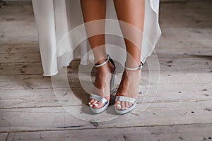 feet in sandals, concept of wedding shoes