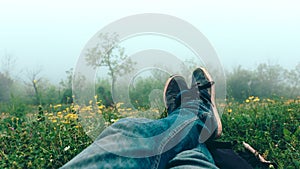 Feet selfie traveler relaxing on ckiff mountains outdoor with