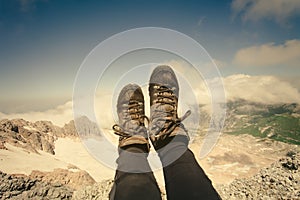 Feet selfie Woman trekking boots relaxing outdoor