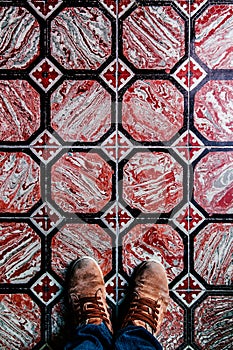 Feet shot on Talavera vinatge floor tiles