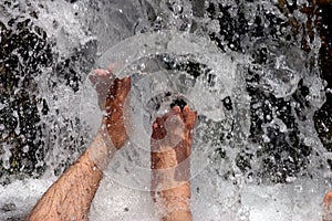 Feet Splashing in Water