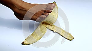 Feet stepped on banana peel. Slipped on a banana peel.