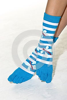 Feet with striped toe socks