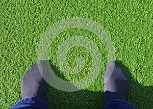 Feet on artificial grass