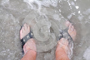 Feet in water