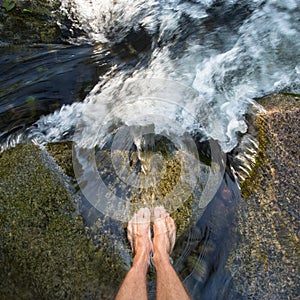 Feet in waterfall