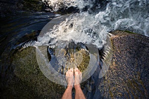Feet in waterfall