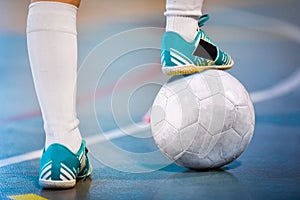 Feet Of White Team Indoor Soccer Player Tread On Soccer Ball