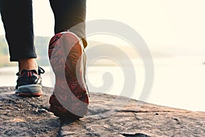 Feet women walking in nature background