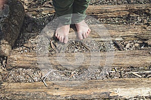 Feet on the wooden road