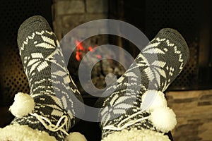 Feet in woolen winter warm socks