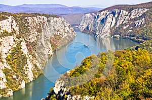 2000 feets of vertical cliffs over Danube river at Djerdap gorge and national park photo