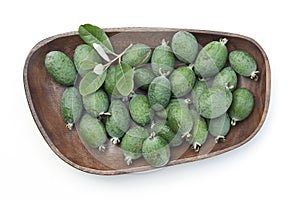 Feijoas in wooden bowl