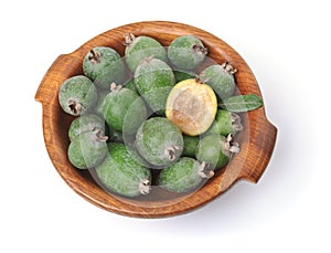 Feijoas in wooden bowl