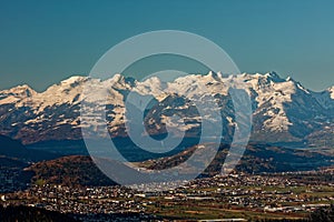 Feldkirch, Rhine valley, Austria - sunrise over Rhine valley with snowy peaks of Apenzell Alps