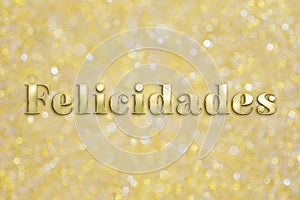 Golden `Felicidades` text on festive background photo