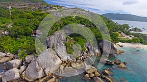 Felicite Island, close to La Digue, Seychelles. Aerial view of tropical coastline on a sunny day