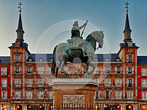 Felipe III King Statue in plaza mayor in Madrid Spain at dusk photo