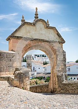 The Felipe V Arch to the Old Bridge in Ronda - Ronda, Andalucia, Spain photo
